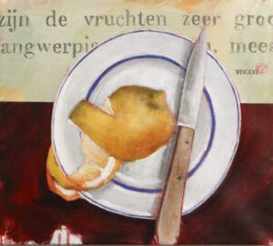 Lemon and knife on a plate
