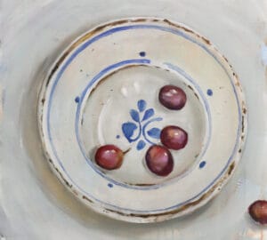 Plate and five grapes