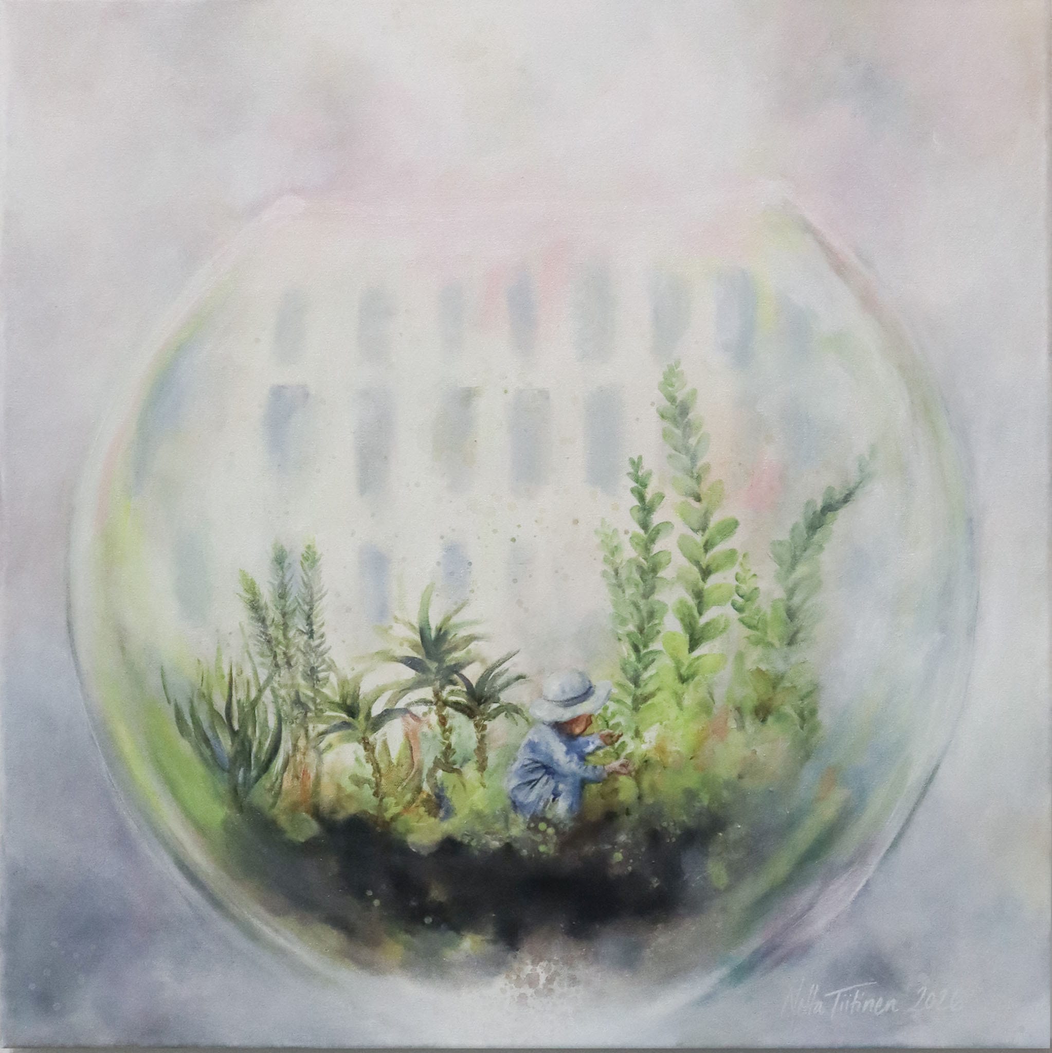 Taimenia hoitava henkilö lasipallossa