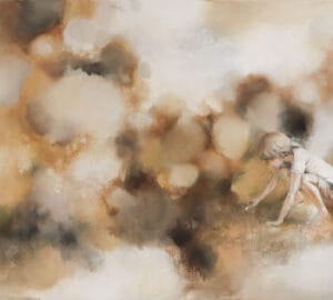 Lapsi leikkii maassa abstraktein värein