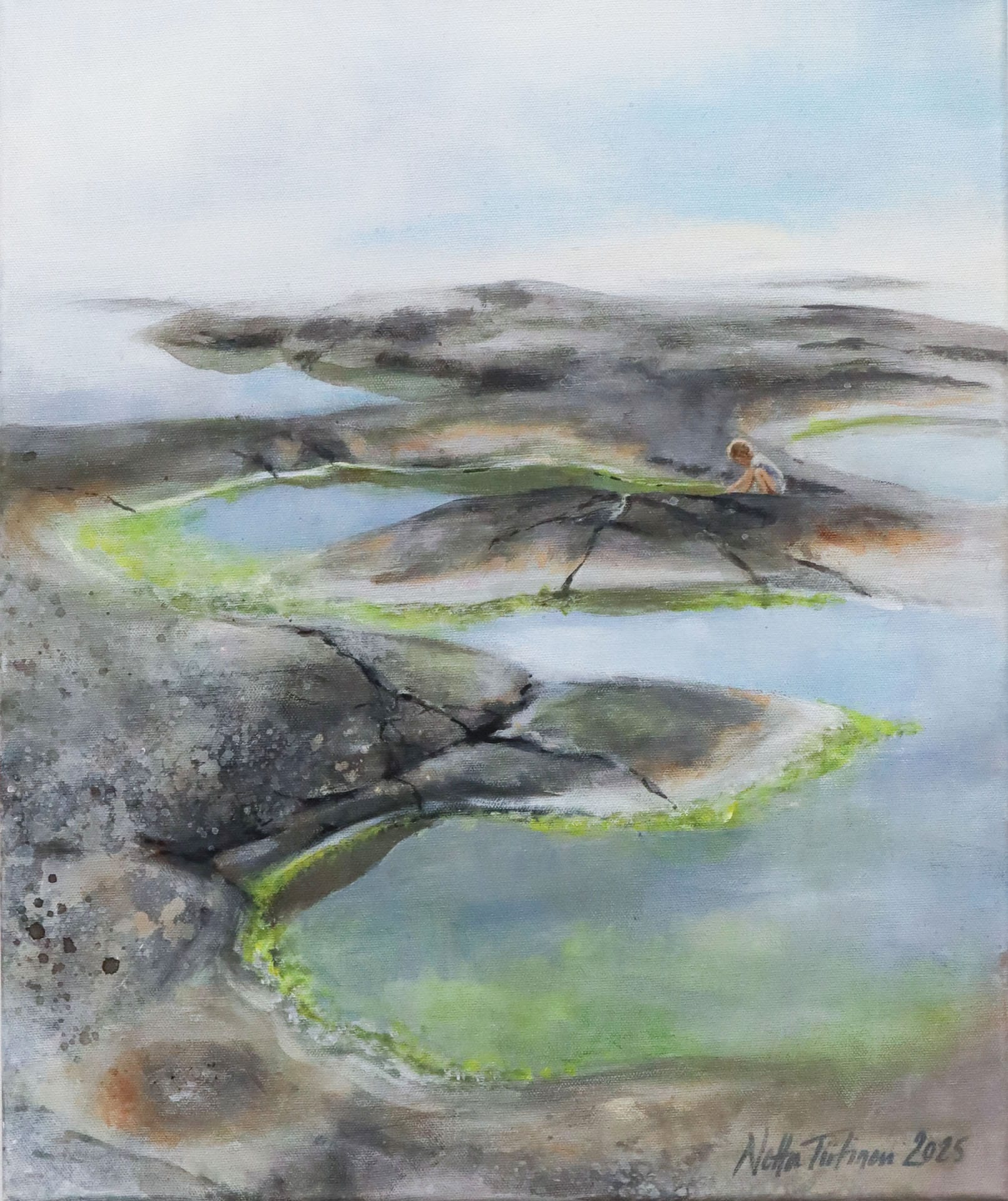 Kalliomaisema ja lapsi rannalla